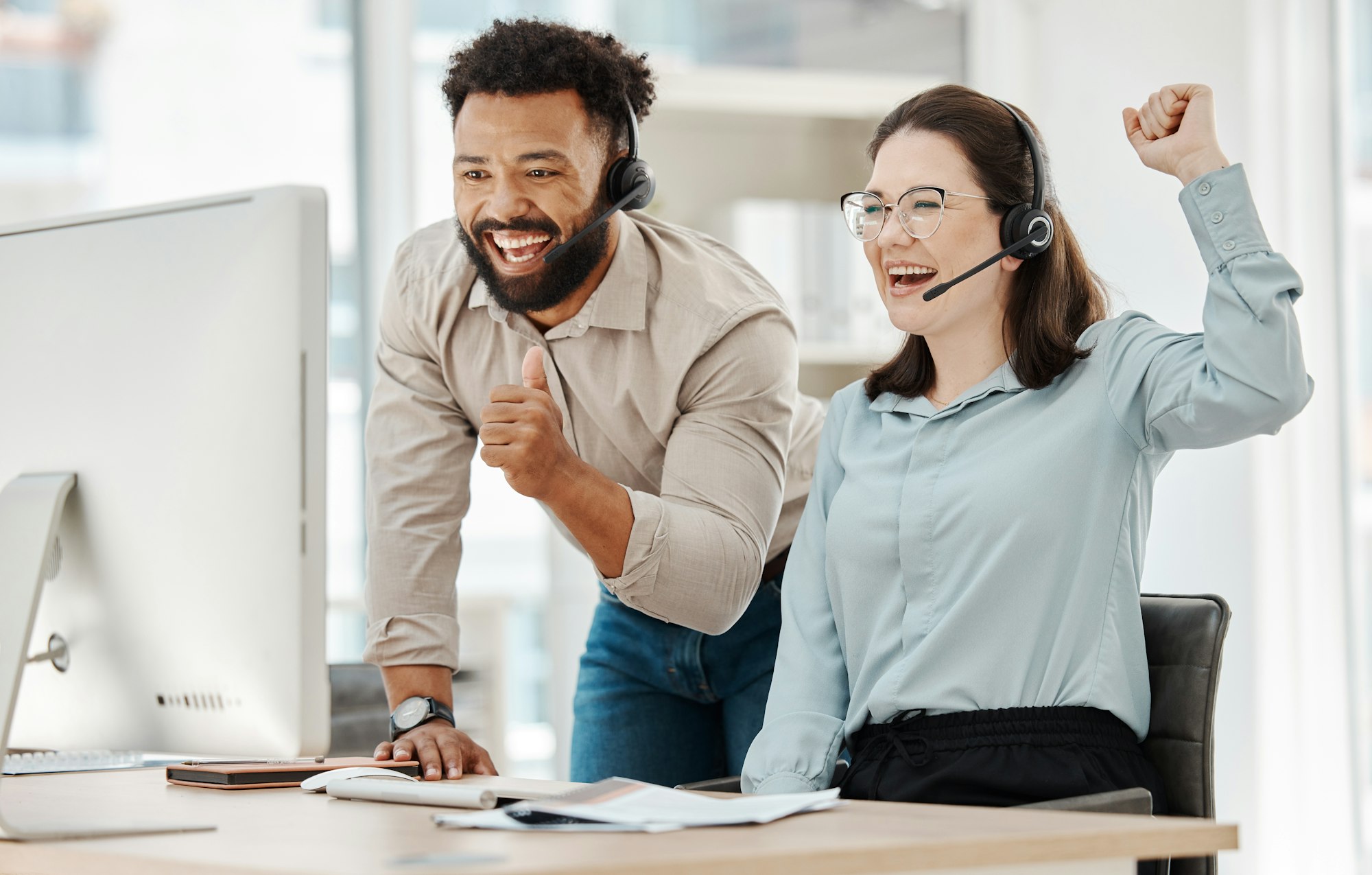 Crm customer support success and internet help workers celebration on a online consultation. Happy