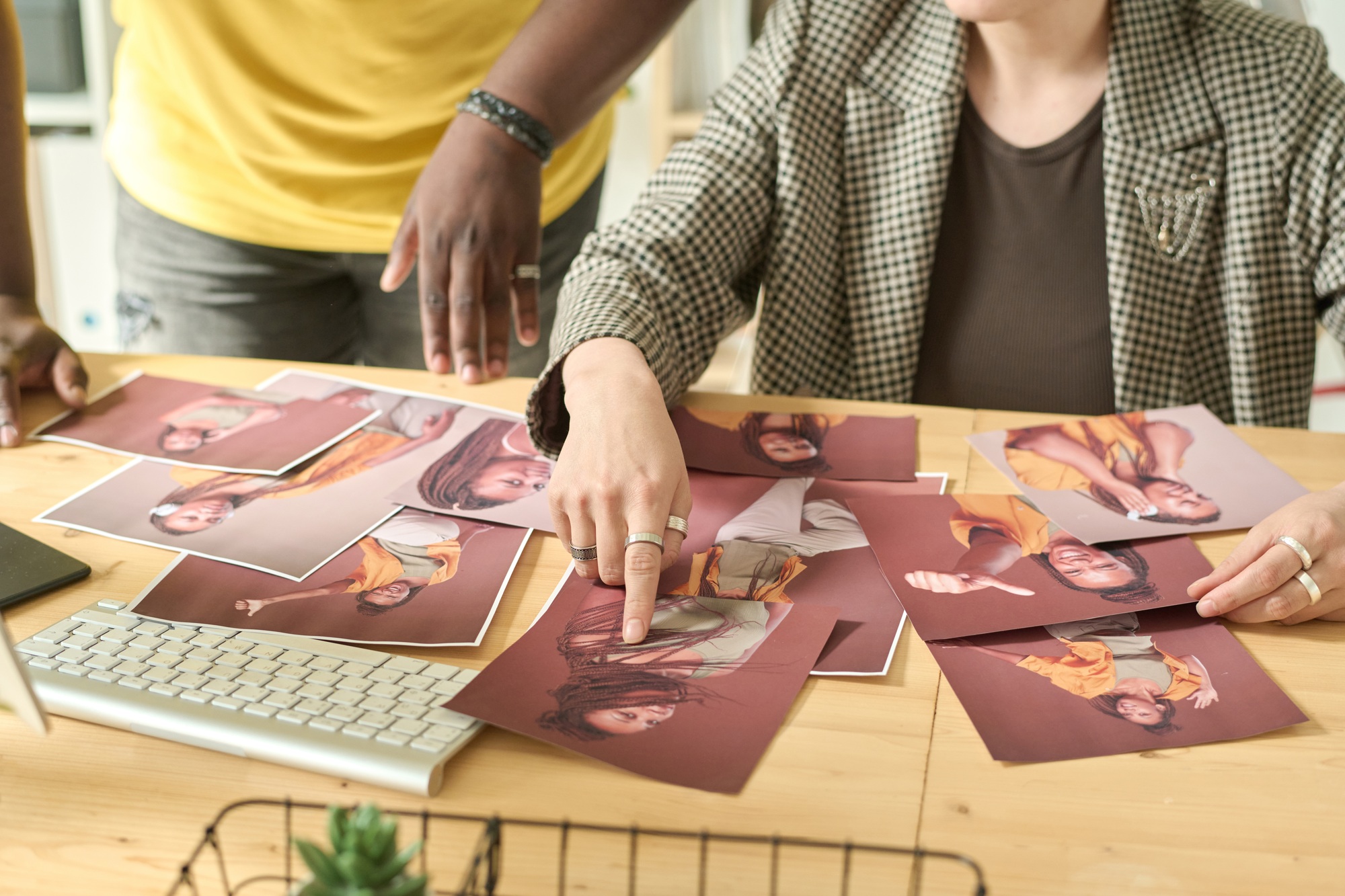 Designer choosing photos for content