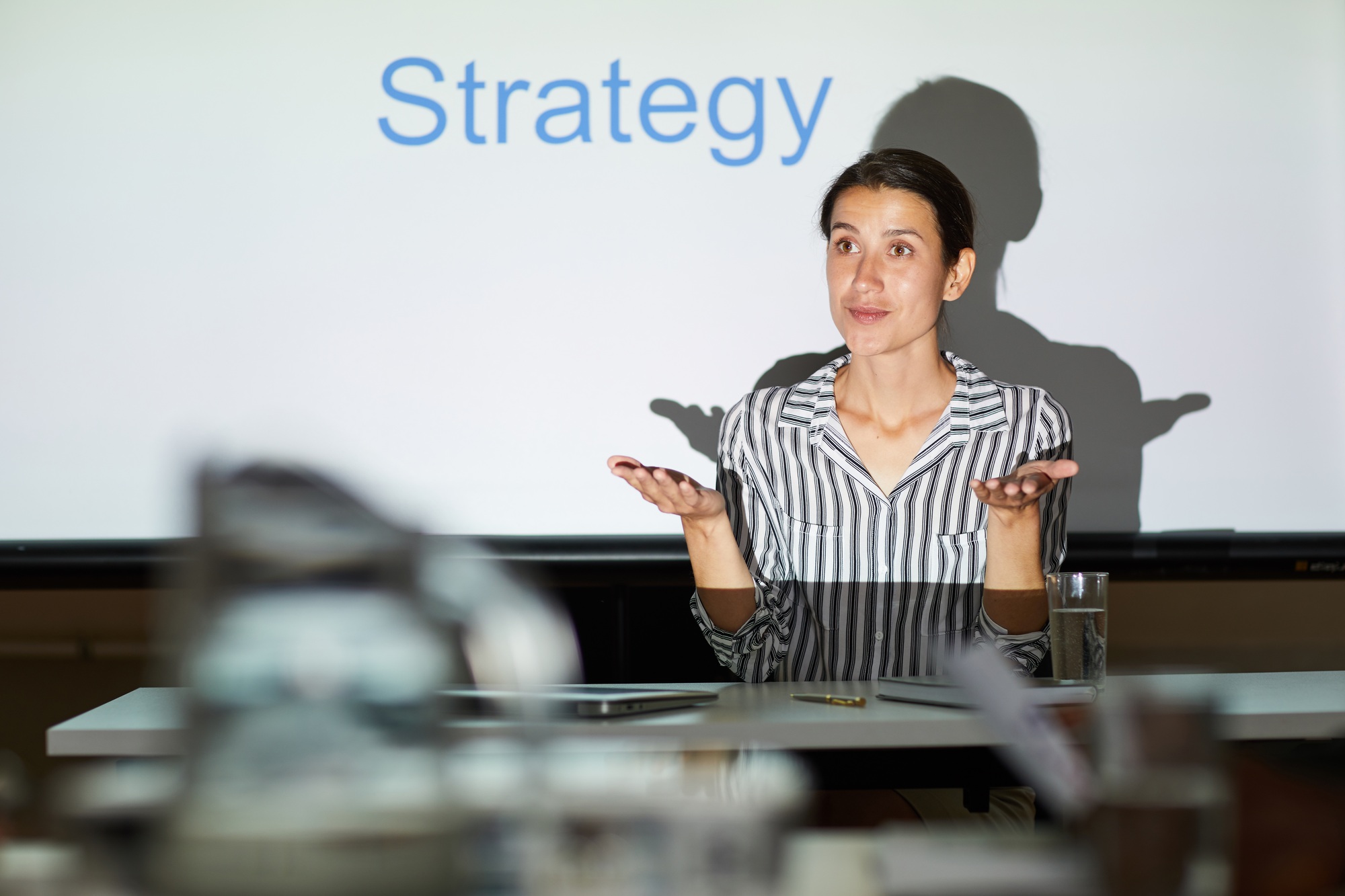 Discussing strategy for achieving goal at meeting